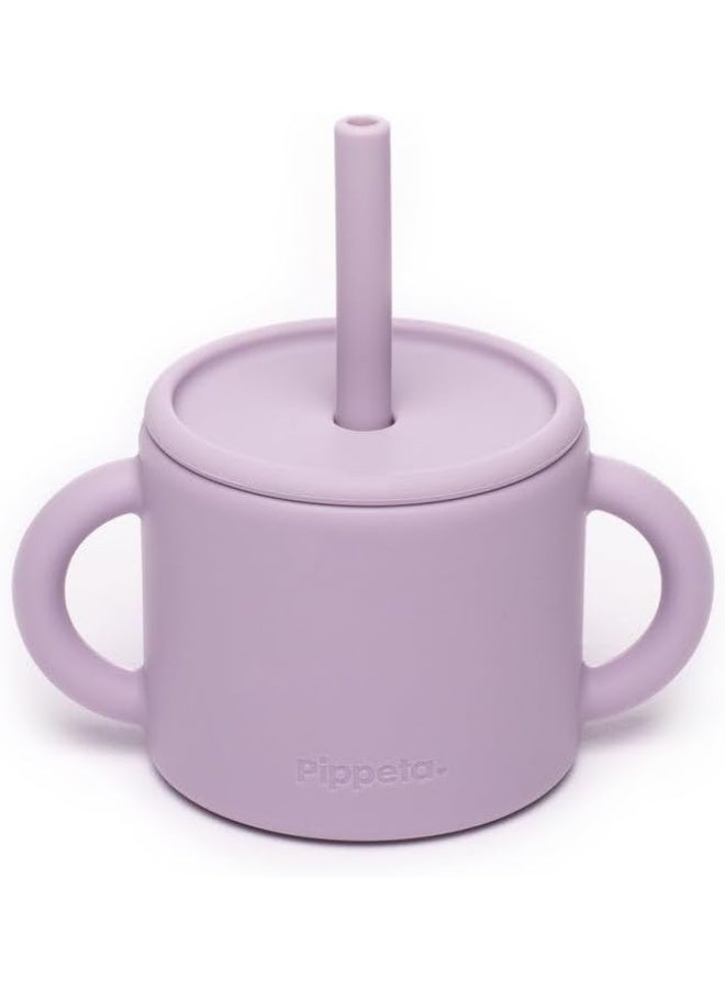 Pippeta The Pippeta Silicone Baby Cup with Straw is designed to help your baby transition smoothly to independent drinking. Its 2-in-1 design allows it to be used as both an open cup and a straw cup, supporting essential developmental skills. Made from BPA-free, food-grade silicone, it is soft, safe, and durable for everyday use. The double handles are perfectly sized for little hands, making it easy to hold and encouraging confidence. Unbreakable and easy to clean, it is both microwave and dishwasher safe. A practical and thoughtfully designed feeding essential for growing babies. - Image 3
