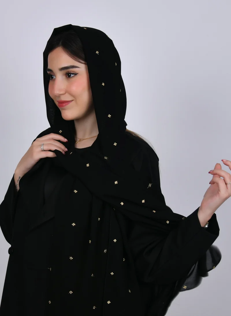 HAWRAA ABAYA A black silk veil with scattered small golden flowers