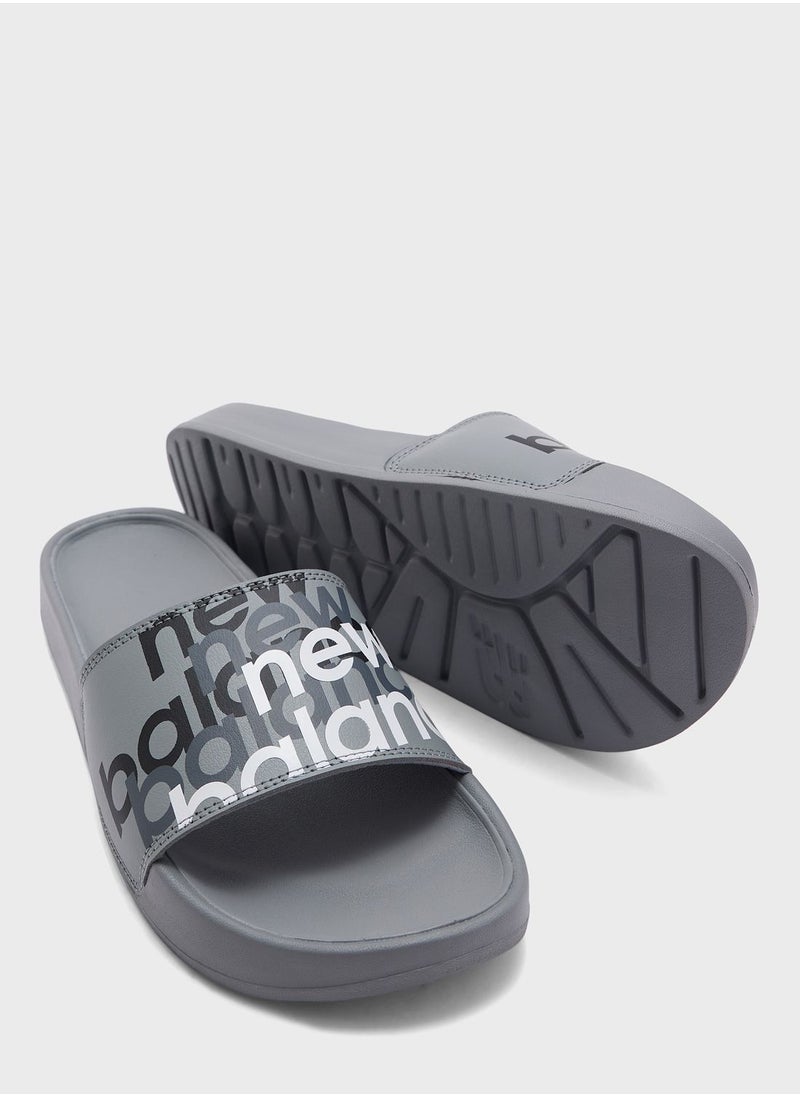 New Balance - 200 شريحة رسومية - Image 1