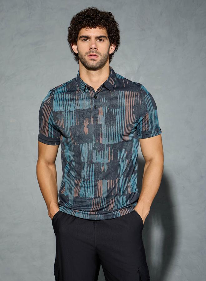 تكنوسبورت تيشيرت بولو رجالي مطبوع بالكامل بقصة ضيقة - Image 1