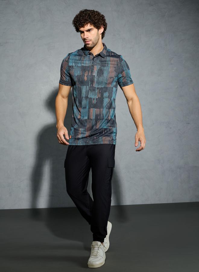 تكنوسبورت تيشيرت بولو رجالي مطبوع بالكامل بقصة ضيقة - Image 2