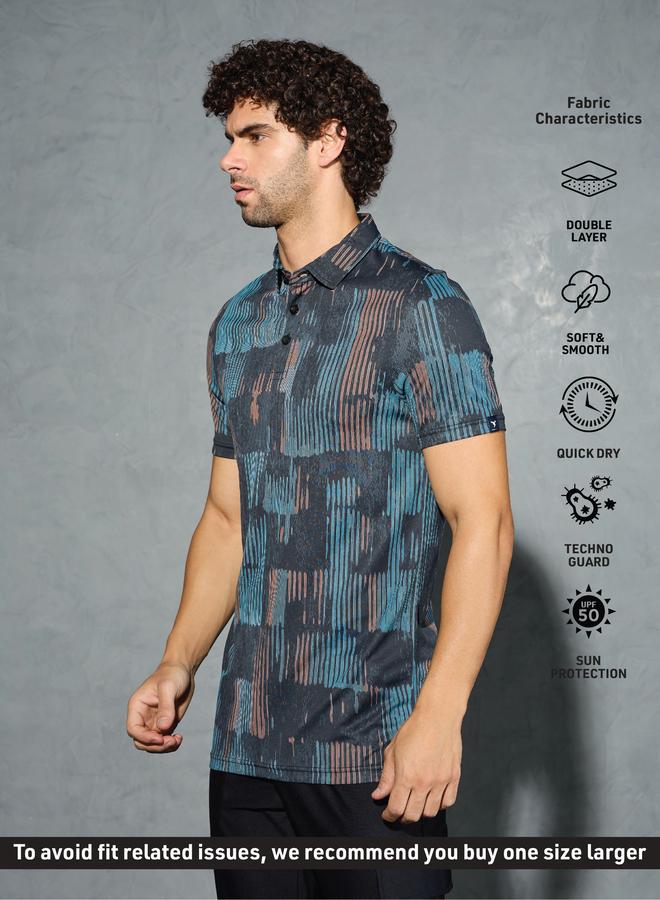 تكنوسبورت تيشيرت بولو رجالي مطبوع بالكامل بقصة ضيقة - Image 4