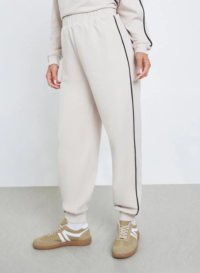 Styli Women Cream Side Stripe Joggers