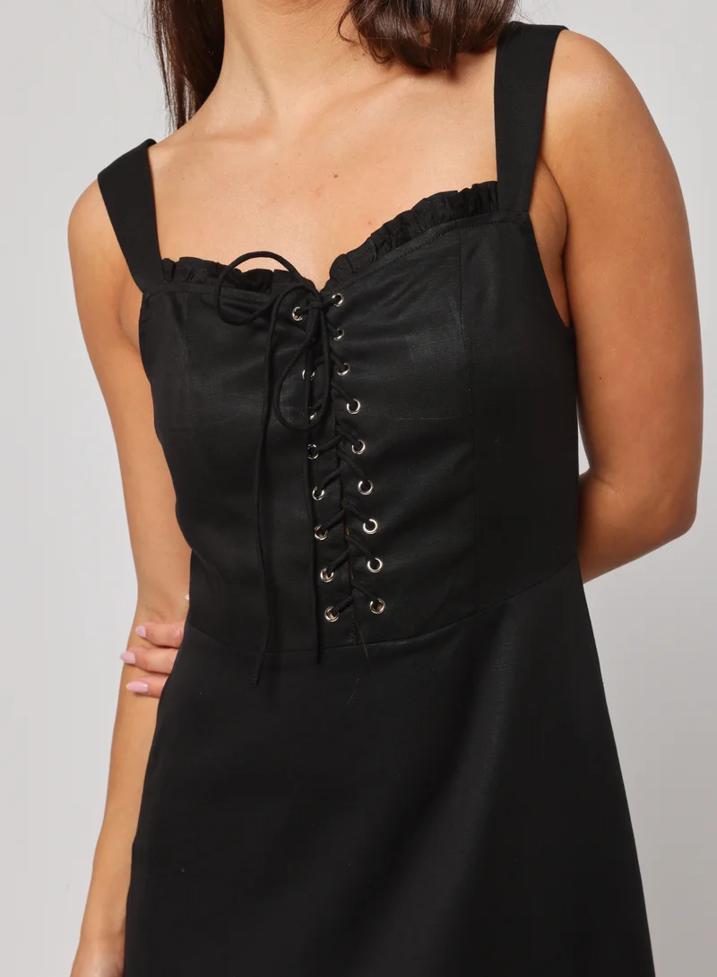 أشيتا فرنانديز Ashita Fernandes Husn dress for women – Midnight Black Linen Dress with Lace-Up Corset Bodice &amp; Tiered Ruffle Skirt