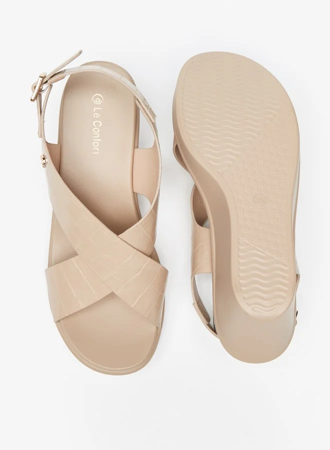 Le Confort Women's Textured Cross Strap Sandals with Wedge Heels and Buckle Closure