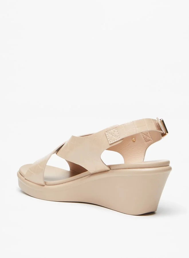 Le Confort Women's Textured Cross Strap Sandals with Wedge Heels and Buckle Closure