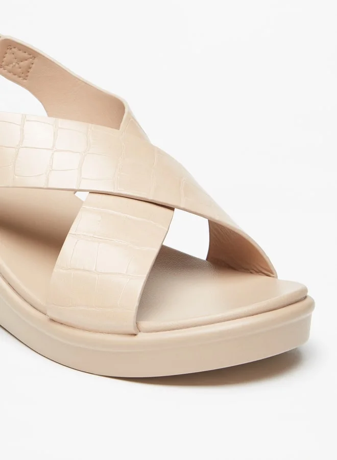 Le Confort Women's Textured Cross Strap Sandals with Wedge Heels and Buckle Closure