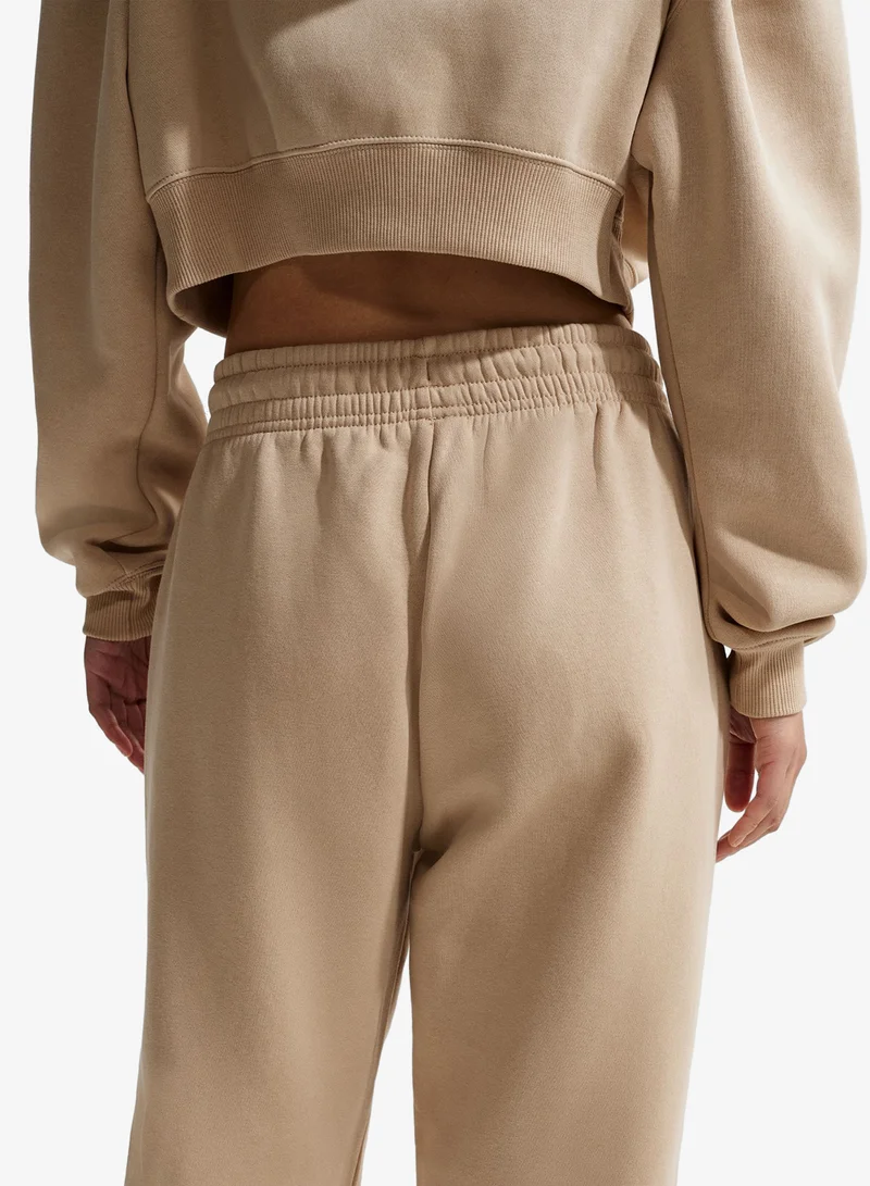 Nike  Nsw Phoenix Fleece High-Rise Oversized Sweatpants for Women | Best Price UAE