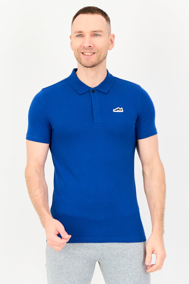 PUMA Men Sportswear Fit Short Sleeve Outdoor Polo Shirt, Blue - Image 1