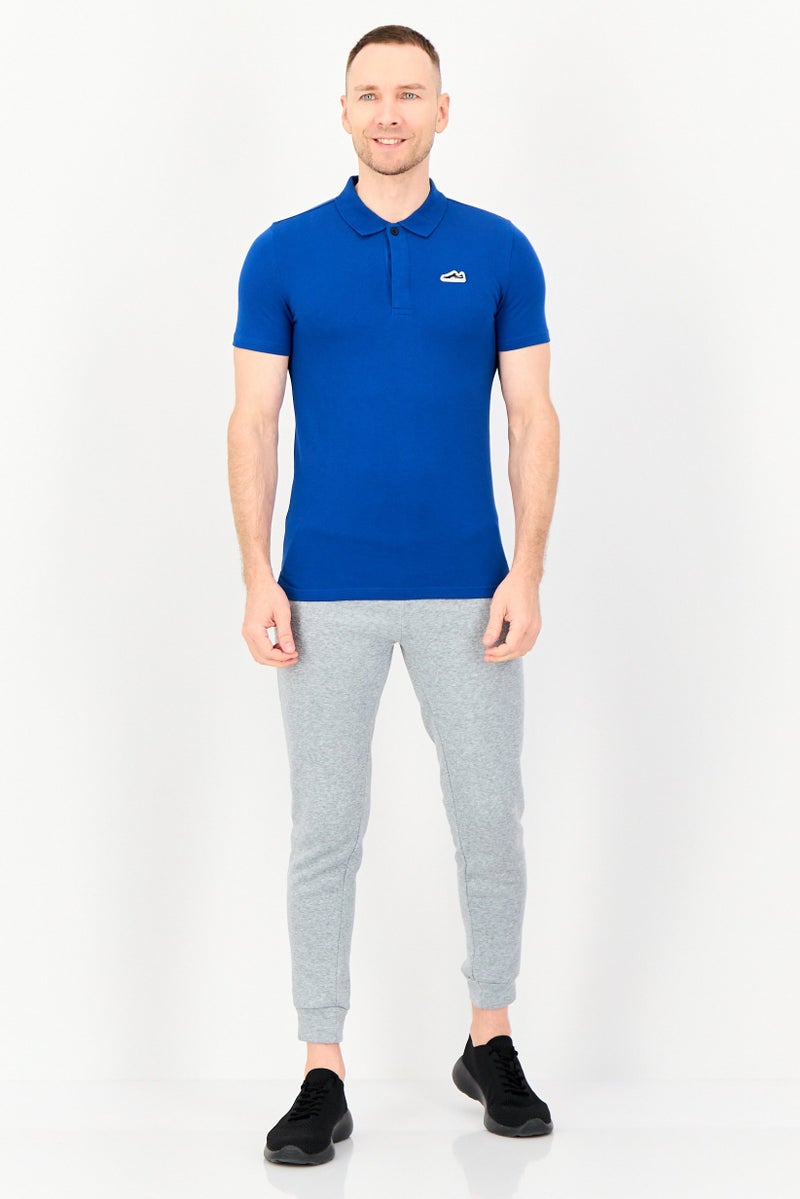 PUMA Men Sportswear Fit Short Sleeve Outdoor Polo Shirt, Blue - Image 4