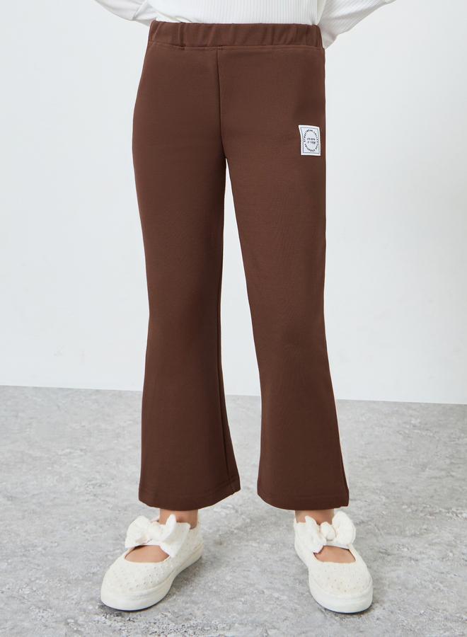 Styli Girls Brown Badge Detail Elastic Waist Leggings - Image 1