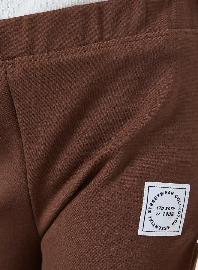 Styli Girls Brown Badge Detail Elastic Waist Leggings