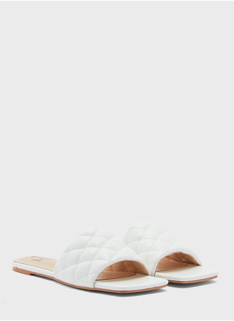 Ginger - Flat Quilted Slide Sandals - Image 1