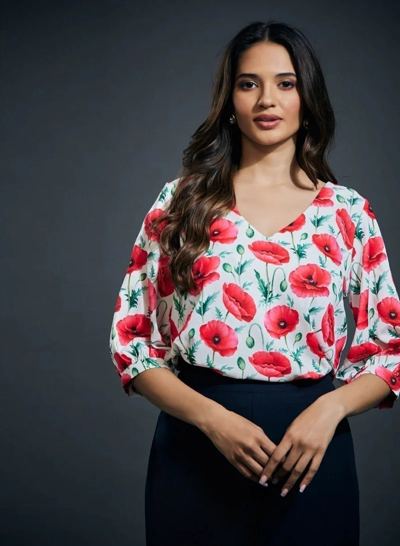 زجزاج بلوزة مطبوعة برقبة على شكل حرف  وأكمام نصفية