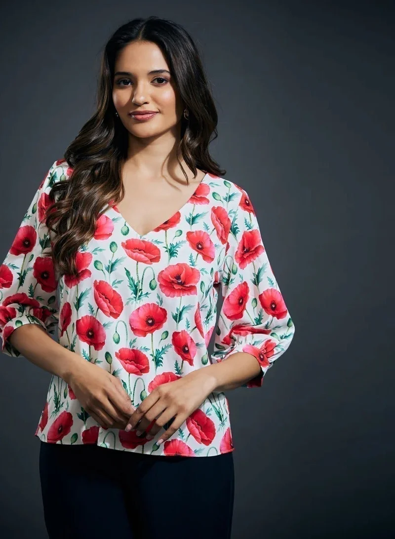 زجزاج بلوزة مطبوعة برقبة على شكل حرف  وأكمام نصفية