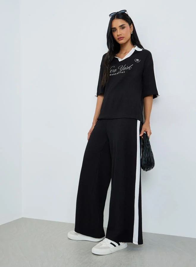 Styli Black Slogan Print Collared Oversized Polo T-Shirt