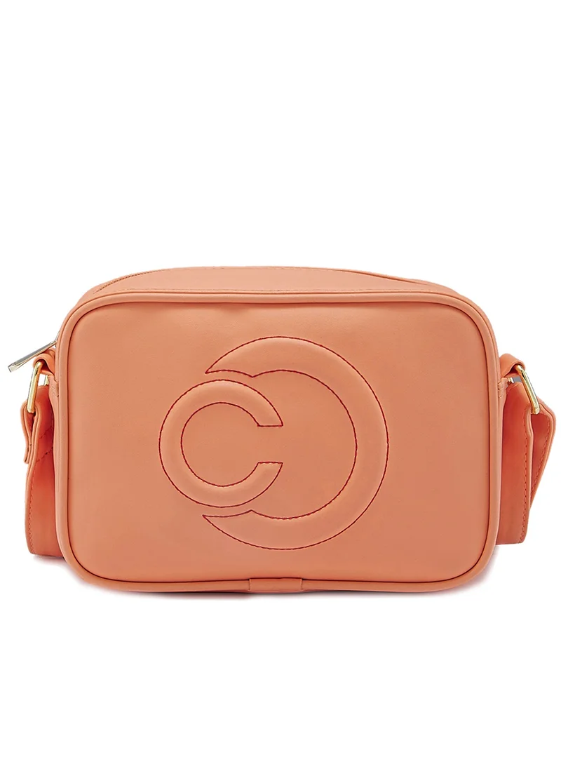 CAPRESE Caprese Dora Solid Coral Faux Leather Medium Sling Bag