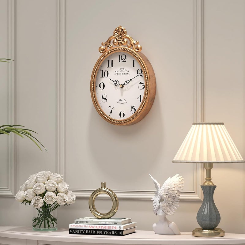 Abdurey ساعة حائطية فرنسية رترو صغيرة الحجم، بتصميم عتيق وذهبي، بشكل بيضاوي، تعمل بالبطارية بشكل صامت، مناسبة للمنازل الريفية، المطابخ، غرف النوم، والحمامات (ارتفاع 10.4 بوصة × عرض 6.7 بوصة). - Image 4
