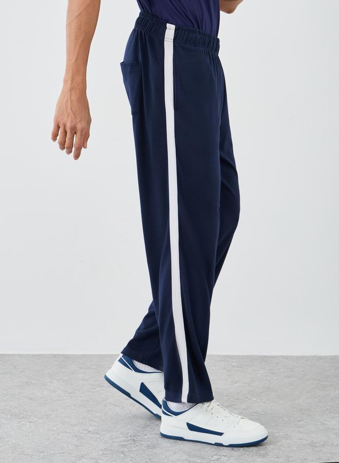 Styli Men Navy Blue Relaxed Fit Side Tape Joggers - Image 1
