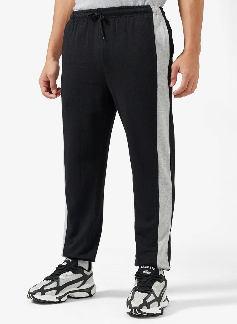 سفنتي فايف بيسيكس بنطلون رياضي واسع بخصر مطاطي وخط جانبي - Image 1