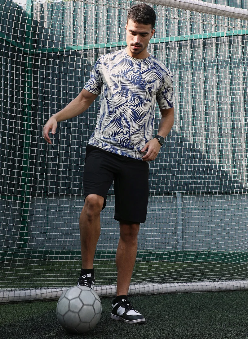 كامبوس سوترا Campus Sutra Men's Indigo Blue & Cream White Abstract-Stroke Activewear T-Shirt For Casual Wear | Crew Neck | Short Sleeves | Jersey T-Shirt Crafted With Comfort Fit For Everyday Wear