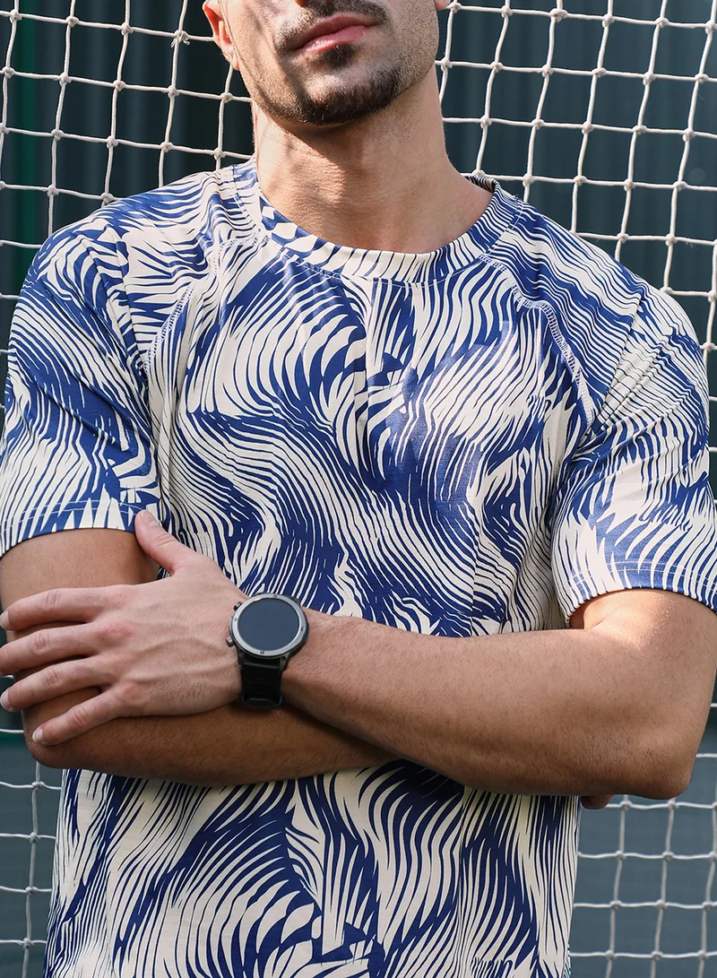 كامبوس سوترا Campus Sutra Men's Indigo Blue & Cream White Abstract-Stroke Activewear T-Shirt For Casual Wear | Crew Neck | Short Sleeves | Jersey T-Shirt Crafted With Comfort Fit For Everyday Wear