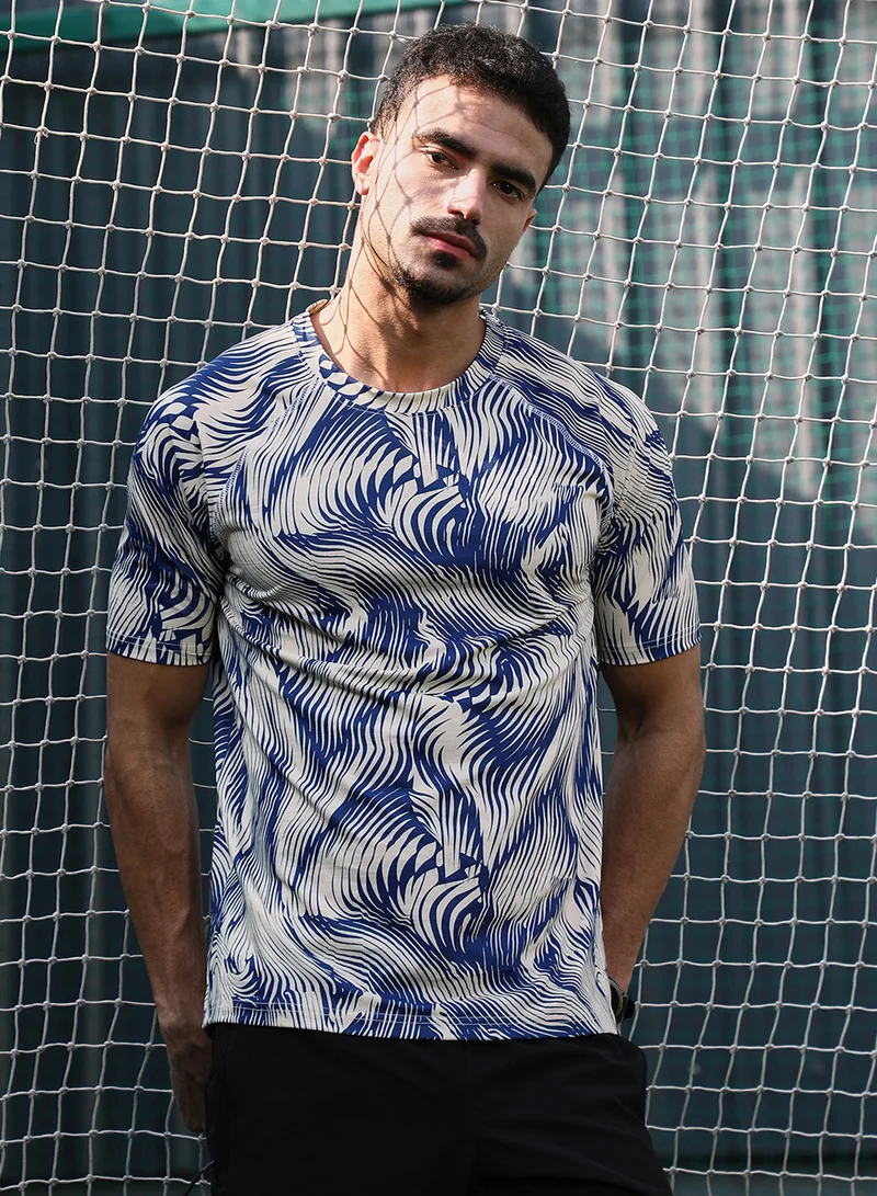 Campus Sutra Campus Sutra Men's Indigo Blue & Cream White Abstract-Stroke Activewear T-Shirt For Casual Wear | Crew Neck | Short Sleeves | Jersey T-Shirt Crafted With Comfort Fit For Everyday Wear