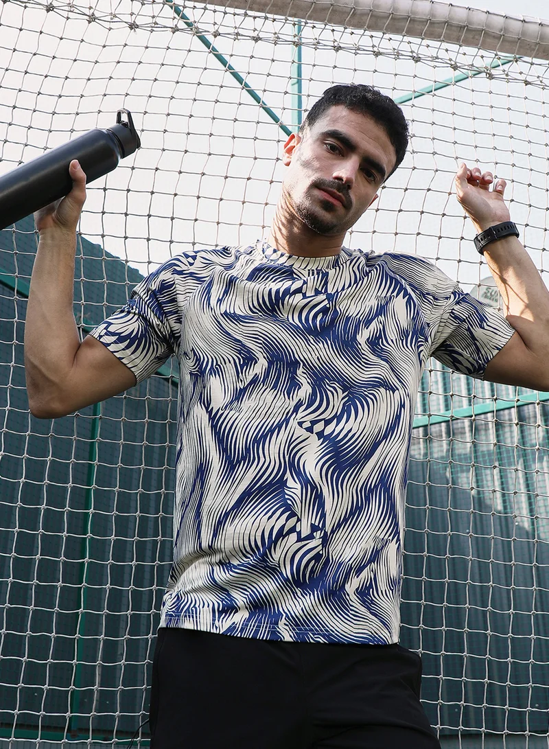 Campus Sutra Campus Sutra Men's Indigo Blue & Cream White Abstract-Stroke Activewear T-Shirt For Casual Wear | Crew Neck | Short Sleeves | Jersey T-Shirt Crafted With Comfort Fit For Everyday Wear
