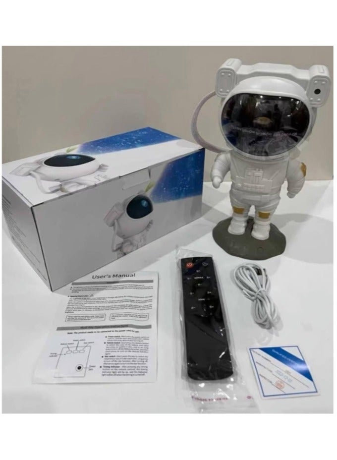 جهاز بروجكتور للاطفال بتصميم على شكل رائد فضاء مع ريموت كنترول مزود باضاءة ليلية LED نجوم واضواء ومجرة قابل للتعديل بزاوية 360 درجة مناسب لغرفة الالعاب والمسرح المنزلي - جهاز عرض ضوئي بتصميم رائد فضاء ضوء ليلي متوهج - Image 2