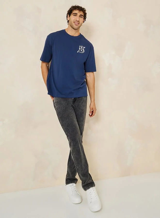 ستايلي Calligraphic Print Compact Jersey Oversized T-Shirt