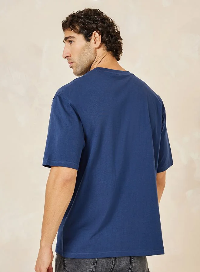 ستايلي Calligraphic Print Compact Jersey Oversized T-Shirt