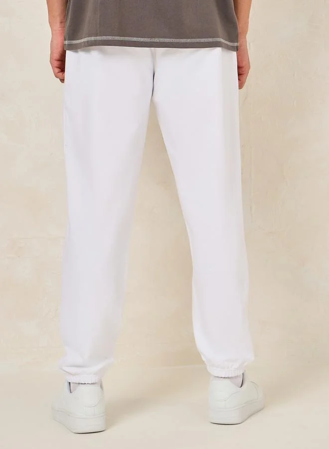 Styli Embroidery Detail Oversized Varsity Joggers