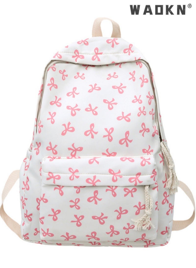 WAOKN Women's small, fresh, bow printed fashionable, simple bow shaped backpack, suitable for middle school students, college students, and campus backpacks, lightweight and lightweight lightweight backpack made of nylon material - Image 1