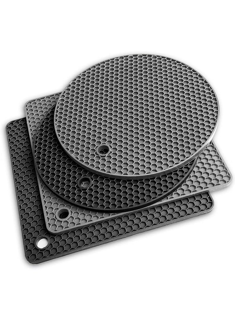 4 Pieces Silicone Trivet Mat, Heat Resistant Kitchen Hot Pot Holder Pad, Non Slip Countertop Protector Double as Jar Opener, Drying Mat, Utensil Rest  - Image 1