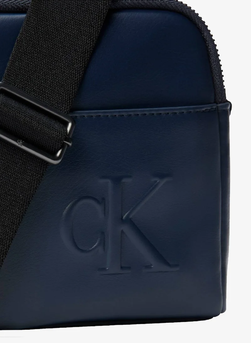 Calvin Klein Blue Nights Embossed Monogram Logo Camera Bag for Men | Best Price UAE