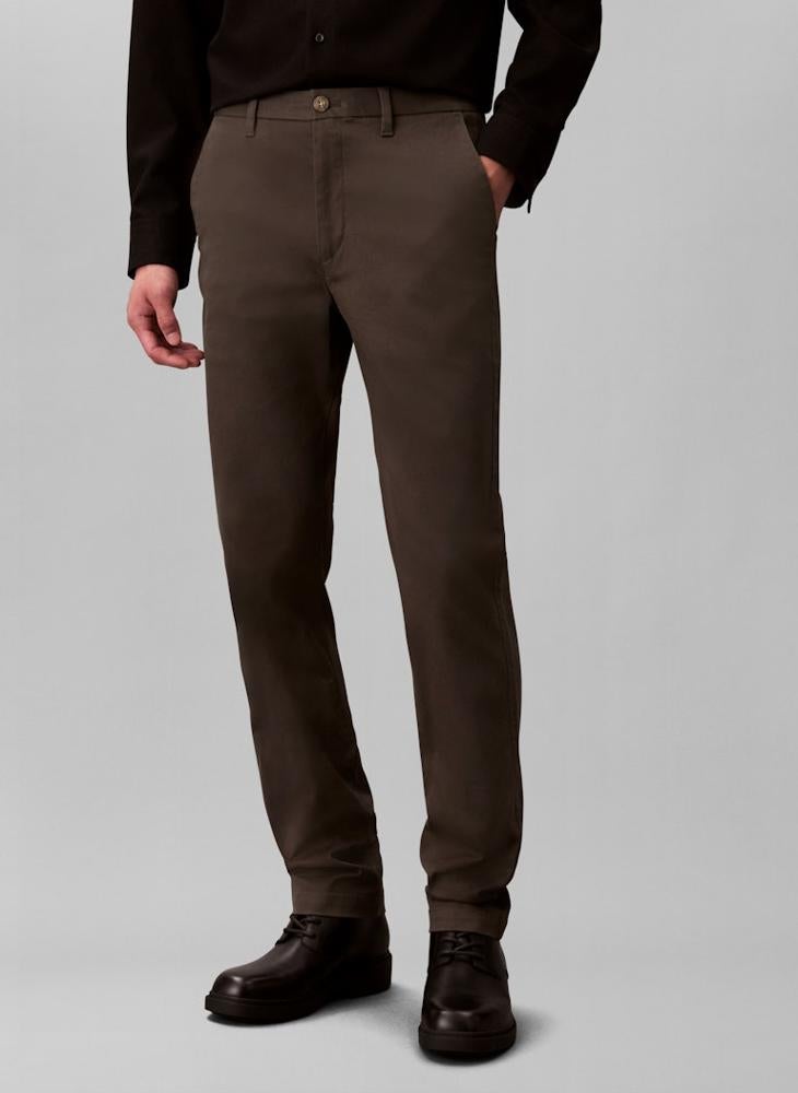 كالفن كلاين بنطال تشينو قطن ضيق ومطاطي - Image 1