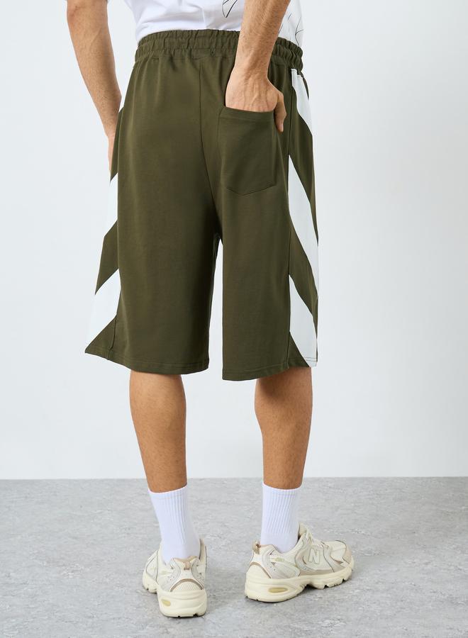 ستايلي شورت واسع قطن تيري بتفاصيل مخططة - Image 4