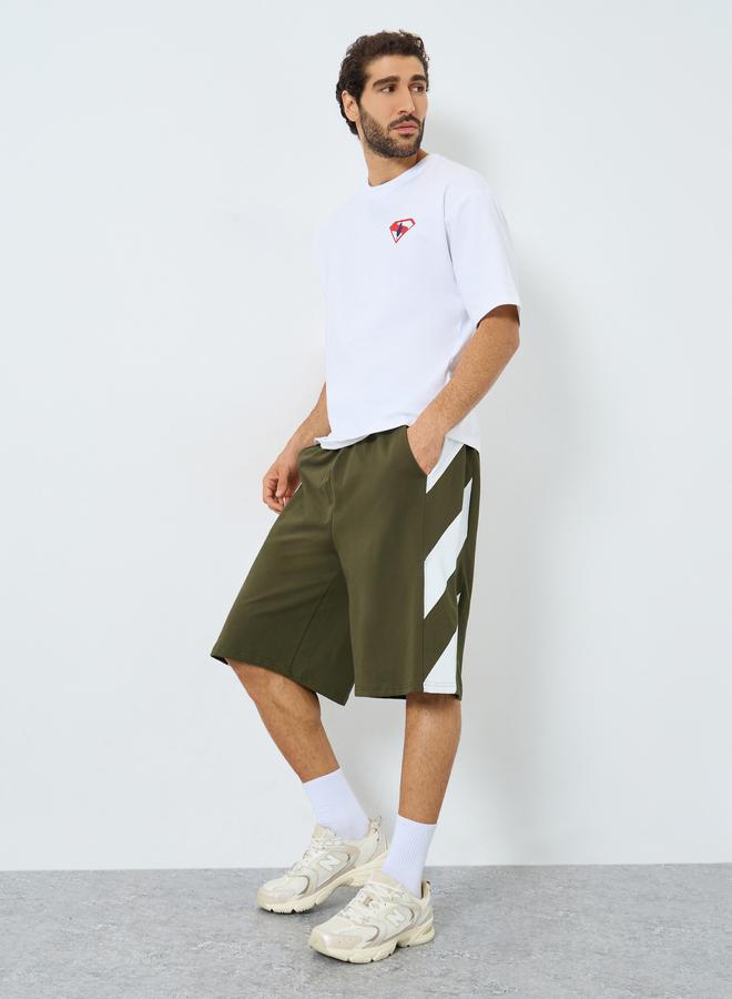 ستايلي شورت واسع قطن تيري بتفاصيل مخططة - Image 2