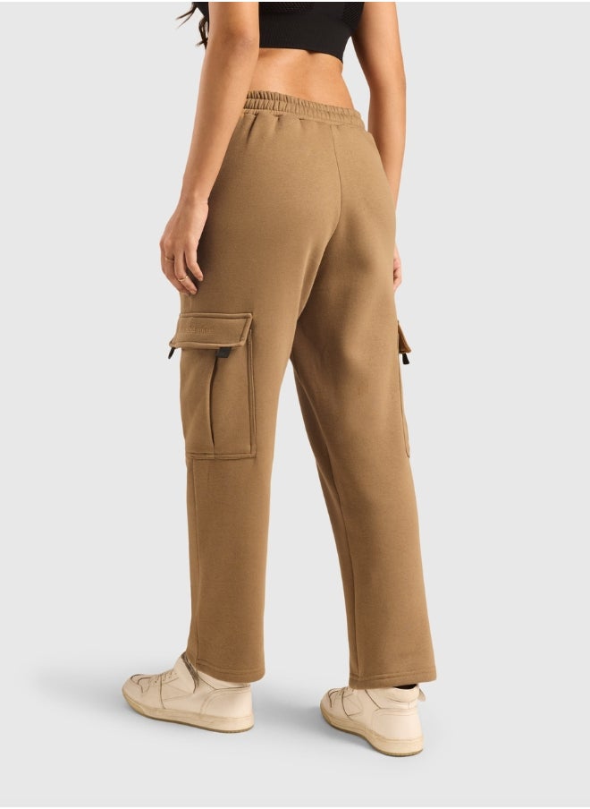 Musclemind Women's Cloud Ease Fleece Cargo Pants with Super Soft And Stretchable Fabric, 6 Deep Pockets, Hidden- Inner Drawstrings, Anti-Pill, Shape Retention, Long-Lasting Colour, Super Soft And Breathable Fabric, Along with Temperature Regulation Tech  - Image 4