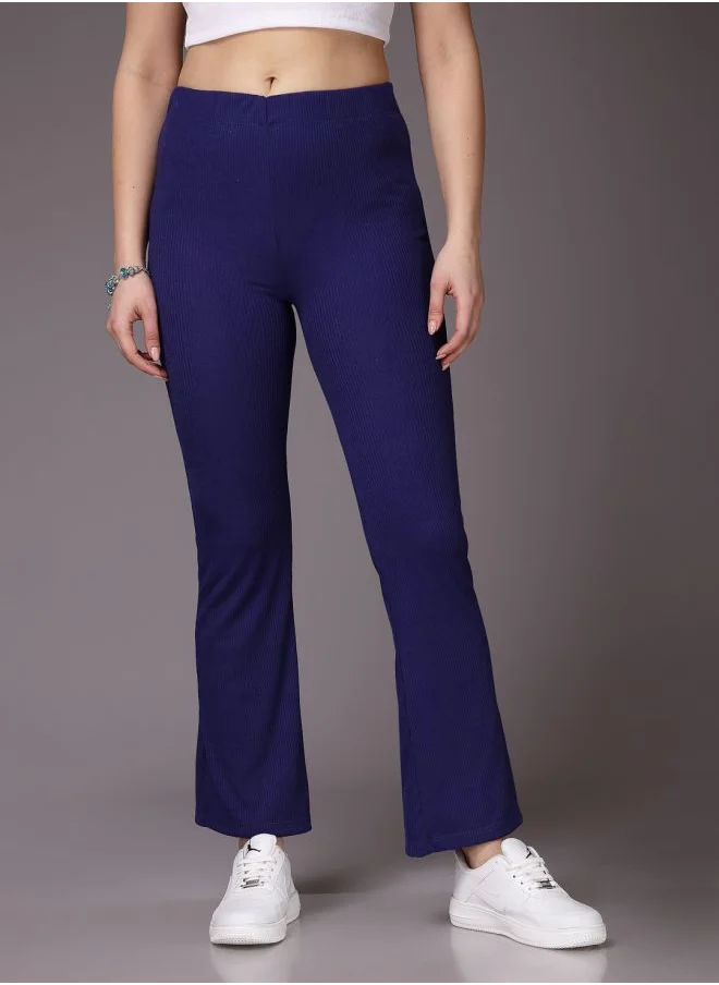 مرفوعة Women Fit and Flared Solid Mid-Rise Trousers