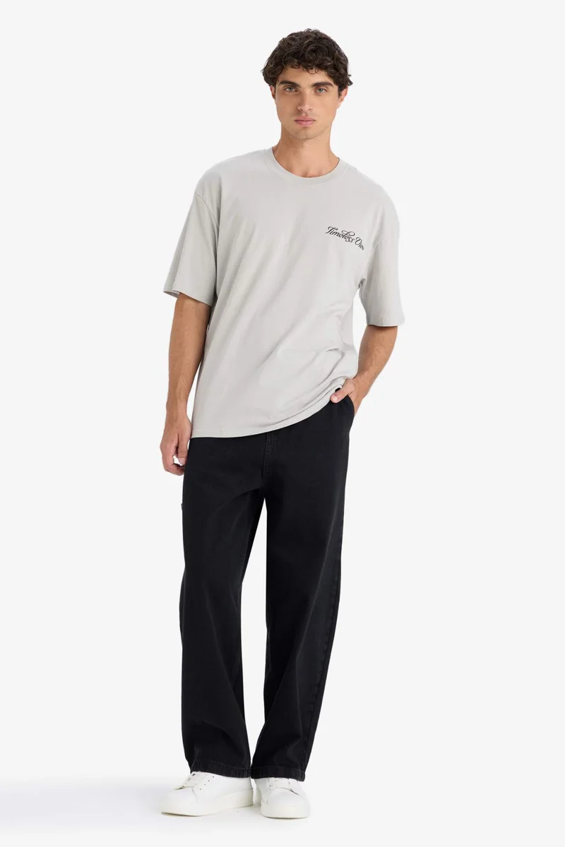 ديفاكتو Boxy Fit Crew Neck Printed Short Sleeve T-Shirt