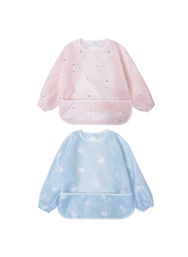 ليتل ديم سوم مريلة أطفال مقاومة للفوضى من ليتل ديمسم | مريلة فنية مقاومة للماء بأكمام طويلة للأطفال الصغار | التقاط الطعام وتنظيفه بالمسح | عبوة من قطعتين بلون البط والأغنام - Image 1