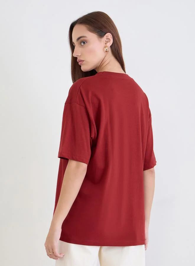 Styli  Styli Red Slogan Print Oversized T-Shirt for Women | Best Price UAE