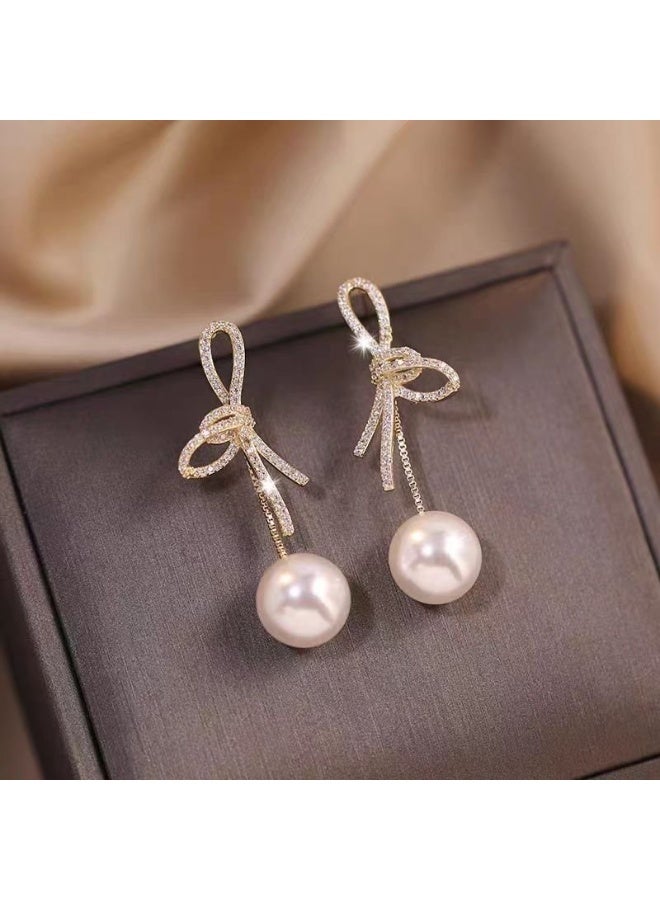 Fashionable and popular temperament high-end silver needle bow pearl earrings French design light luxury earrings - Image 4