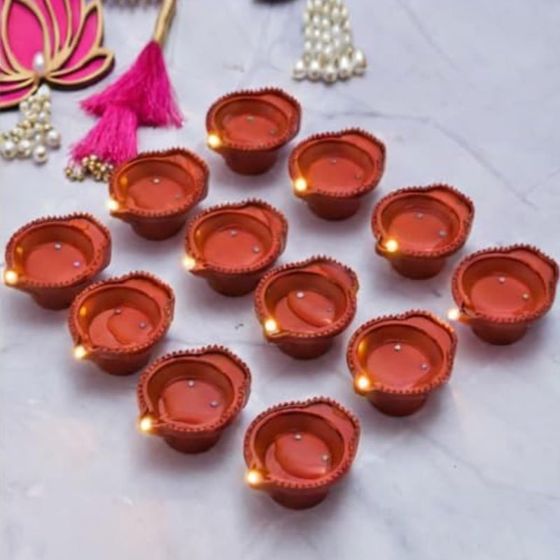 Bindian شموع LED حساسة للماء | شموع زخرفية بدون لهب مع بطاريات قابلة للاستبدال | خالية من الدخان وآمنة وقابلة لإعادة الاستخدام لزينة المهرجانات (عبوة من 18) - Image 1