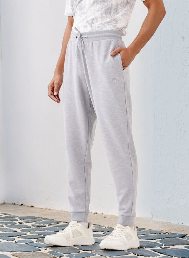 كابا بنطال رياضي بخصر برباط وجيوب - Image 1