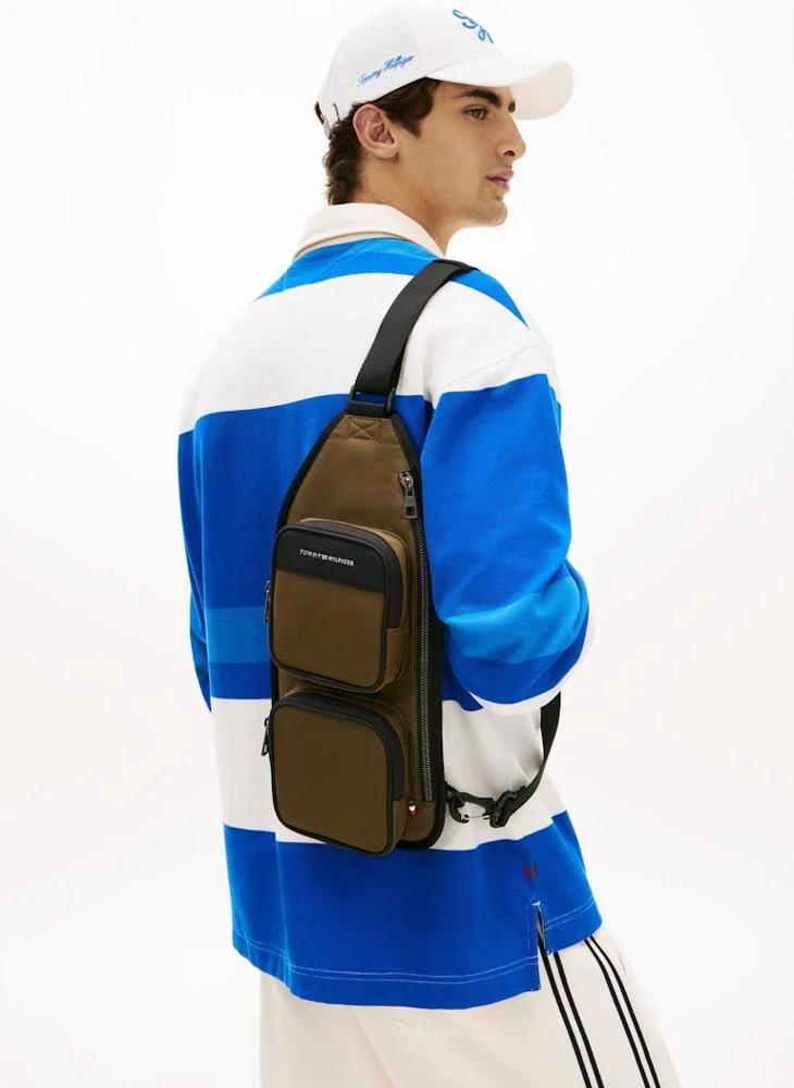 Tommy Hilfiger Willow Green Metal Logo Sling Backpack for Men | Best Price UAE