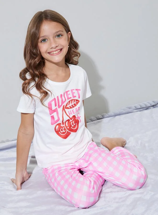 Styli Girls White Graphic Print T-Shirt and Pink Checked Pants Pyjama Set