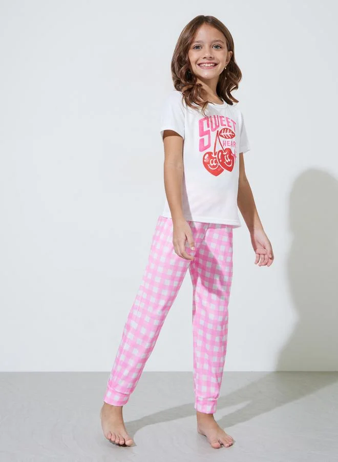 Styli Girls White Graphic Print T-Shirt and Pink Checked Pants Pyjama Set
