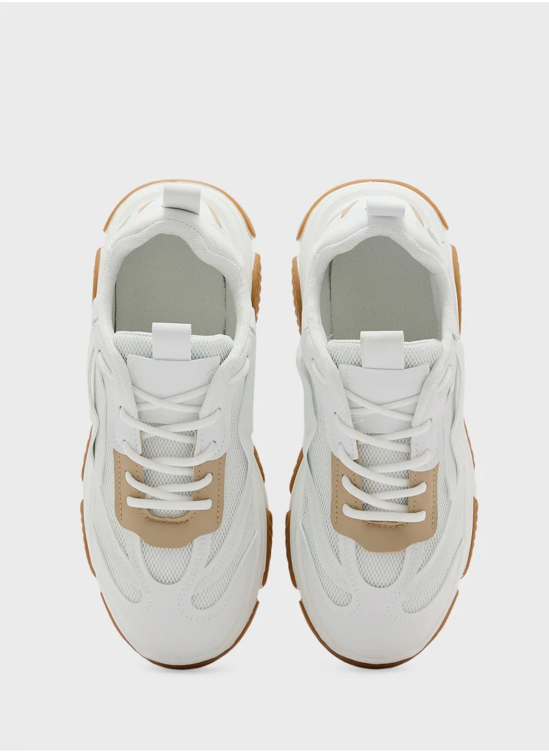 ترافل من نمشي Contrast Outsole Chunky Sneakers